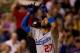 DENVER, CO - JULY 3: Matt Kemp #27 of the Los Angeles Dodgers points to the sky as he celebrates his ninth inning home run against the Colorado Rockies at Coors Field on July 3, 2013 in Denver, Colorado. The Dodgers defeated the Rockies 10-8. (Photo by Justin Edmonds/Getty Images)