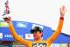 KNOWSLEY, ENGLAND - SEPTEMBER 17: Sir Bradley Wiggins of Great Britain and SKY Procycling celebrates taking the race leaders gold jersey after winning stage three of the Tour of Britain, a 16km individual time trial in Knowsley Safari Park, on September 17, 2013 in Knowsley, England. (Photo by Bryn Lennon/Getty Images)