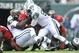 Sep 8, 2013; East Rutherford, NJ, USA; New York Jets defensive tackle Sheldon Richardson (91) tackles Tampa Bay Buccaneers running back Doug Martin (22) during the first half at MetLife Stadium. The Jets won 18-17. Mandatory Credit: Joe Camporeale-USA TODAY Sports