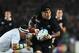 AUCKLAND, NEW ZEALAND - SEPTEMBER 24: Ma'a Nonu of the All Blacks is tackled by Jean-Baptiste Poux of France during the IRB 2011 Rugby World Cup Pool A match between New Zealand and France at Eden Park on September 24, 2011 in Auckland, New Zealand. (Photo by Sandra Mu/Getty Images)