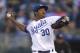 KANSAS CITY, MO - SEPTEMBER 17: Starting pitcher Yordano Ventura #30 of the Kansas City Royals throws in the first inning against the Cleveland Indians at Kauffman Stadium on September 17, 2013 in Kansas City, Missouri. (Photo by Ed Zurga/Getty Images)