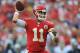 KANSAS CITY, MO - SEPTEMBER 15: Quarterback Alex Smith of the Kansas City Chiefs throws a pass down field against the Dallas Cowboys during the first half on September 15, 2013 at Arrowhead Stadium in Kansas City, Missouri. (Photo by Peter Aiken/Getty Images)