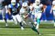 INDIANAPOLIS, IN - SEPTEMBER 15: Brian Hartline #82 of the Miami Dolphins runs with the ball during the NFL game against the Indianapolis Colts at Lucas Oil Stadium on September 15, 2013 in Indianapolis, Indiana. (Photo by Andy Lyons/Getty Images)
