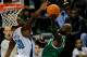 December 28, 2011; New Orleans, LA, USA; Boston Celtics power forward Kevin Garnett (5) has his shot blocked by New Orleans Hornets center Emeka Okafor (50) during the fourth quarter of a game at the New Orleans Arena. The Hornets defeated the Celtics 97-78. Mandatory Credit: Derick E. Hingle-USA TODAY Sports