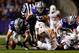 MANHATTAN, KS - DECEMBER 01: Offensive linesman Drew Liddle #61 of the Kansas State Wildcats dives for a loose ball as defensive back Duke Thomas #21 of the Texas Longhorns watches during the game at Bill Snyder Family Football Stadium on December 1, 2012 in Manhattan, Kansas. (Photo by Jamie Squire/Getty Images)