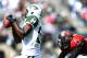 Sep 8, 2013; East Rutherford, NJ, USA; New York Jets wide receiver Stephen Hill (84) makes a catch while being covered by Tampa Bay Buccaneers defensive back Michael Adams (21) during the second half at MetLife Stadium. The Jets won 18-17. Mandatory Credit: Joe Camporeale-USA TODAY Sports