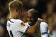 LONDON, ENGLAND - SEPTEMBER 19: Lewis Holtby of Spurs congratulates Jermain Defoe of Spurs on scoring his second goal during the UEFA Europa League Group K match between Tottenham Hotspur FC and Tromso IL at White Hart Lane on September 19, 2013 in London, England. (Photo by Clive Rose/Getty Images)