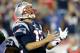 FOXBORO, MA - SEPTEMBER 12: Quarterback Tom Brady #12 of the New England Patriots reacts after an incomplete pass in the second quarter while taking on the New York Jets at Gillette Stadium on September 12, 2013 in Foxboro, Massachusetts. (Photo by Jim Rogash/Getty Images)