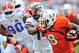 Sep 7, 2013; Miami Gardens, FL, USA; Miami Hurricanes running back Duke Johnson (8) stiff arms Florida Gators defensive back Jaylen Watkins (14) during the second half at Sun Life Stadium. Mandatory Credit: Steve Mitchell-USA TODAY Sports