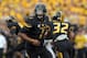 Aug 31, 2013; Columbia, MO, USA; Missouri Tigers quarterback James Franklin (1) hands off to running back Russell Hansbrough (32) during the first half of the game against the Murray State Racers at Faurot Field. Missouri won 58-14. Mandatory Credit: Denny Medley-USA TODAY Sports