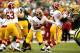 GREEN BAY, WI - SEPTEMBER 15: Quarteback Robert Griffen III of the Washington Redskins is forced out of the pocket while playing the Green Bay Packers at Lambeau Field on September 15, 2013 in Green Bay, Wisconsin. (Photo by Matthew Stockman/Getty Images)