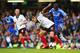 LONDON, ENGLAND - SEPTEMBER 21: Ramires (R) of Chelsea challenges Alex Kacaniklic (L) of Fulham during the Barclays Premier League match between Chelsea and Fulham at Stamford Bridge on September 21, 2013 in London, England. (Photo by Julian Finney/Getty Images)