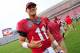 ATHENS, GA - SEPTEMBER 21: Aaron Murray #11 of the Georgia Bulldogs celebrates after the game against the North Texas Mean Green at Sanford Stadium on September 21, 2013 in Athens, Georgia. (Photo by Scott Cunningham/Getty Images)