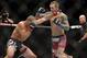 Sep 21, 2013; Toronto, Ontario, CAN; Renan Barao (left) fights Eddie Wineland during their interim bantamweight championship bout at UFC 165 at the Air Canada Centre. Mandatory Credit: Tom Szczerbowski-USA TODAY Sports