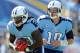 SAN DIEGO, CA - SEPTEMBER 16: Jake Locker #10 of the Tennessee Titans hands off to Chris Johnson #28 of the San Diego Chargers at Qualcomm Stadium on September 16, 2012 in San Diego, California. (Photo by Harry How/Getty Images)