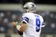 Sep 22, 2013; Arlington, TX, USA; Dallas Cowboys quarterback Tony Romo (9) throws a warm up pass before the game against the St. Louis Rams at AT&T Stadium. Mandatory Credit: Tim Heitman-USA TODAY Sports