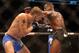 Sep 21, 2013; Toronto, Ontario, CAN; Jon Jones fights Alexander Gustafsson (left) during their light heavyweight championship bout at UFC 165 at the Air Canada Centre. Mandatory Credit: Tom Szczerbowski-USA TODAY Sports