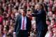 LIVERPOOL, ENGLAND - MAY 05: Everton Manager David Moyes gestures as Liverpool Manager Brendan Rodgers looks on during the Barclays Premier League match between Liverpool and Everton at Anfield on May 5, 2013 in Liverpool, England. (Photo by Laurence Griffiths/Getty Images)
