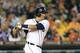 DETROIT, MI - SEPTEMBER 20: Victor Martinez #41 of the Detroit Tigers singles to right field in the third inning of the game against the Chicago White Sox at Comerica Park on September 20, 2013 in Detroit, Michigan. (Photo by Leon Halip/Getty Images)