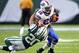 Sep 22, 2013; East Rutherford, NJ, USA; Buffalo Bills running back C.J. Spiller (28) pushes off New York Jets cornerback Kyle Wilson (20) at MetLife Stadium. Mandatory Credit: Robert Deutsch-USA TODAY Sports