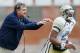 COLLEGE PARK, MD - NOVEMBER 03: Head coach Paul Johnson talks to quarterback Vad Lee #2 of the Georgia Tech Yellow Jackets during the second half of the Yellow Jackets 33-13 win over the Maryland Terrapins at Byrd Stadium on November 3, 2012 in College Park, Maryland. (Photo by Rob Carr/Getty Images)