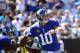 Sep 22, 2013; Charlotte, NC, USA; New York Giants quarterback Eli Manning (10) looks to pass in the second quarter at Bank of America Stadium. Mandatory Credit: Bob Donnan-USA TODAY Sports