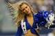 ARLINGTON, TX - SEPTEMBER 22: A Dallas Cowboys Cheeleader performs at AT&T Stadium on September 22, 2013 in Arlington, Texas. (Photo by Ronald Martinez/Getty Images)