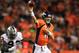 DENVER, CO - SEPTEMBER 23: Peyton Manning #18 of the Denver Broncos passes under pressure from Jason Hunter #93 of the Oakland Raiders at Sports Authority Field at Mile High on September 23, 2013 in Denver, Colorado. (Photo by Doug Pensinger/Getty Images)