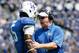 Sep 7, 2013; Lexington, KY, USA; Kentucky Wildcats head coach Mark Stoops talks with safety Ashely Lowery (5) during the game against the Miami (Oh) Redhawks at Commonwealth Stadium. Mandatory Credit: Mark Zerof-USA TODAY Sports