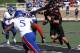 Nov 10, 2012; Lubbock, TX, USA; Texas Tech Red Raiders quarter back Michael Brewer (16) rushes against the Kansas Jayhawks in the first half at Jones AT&T Stadium. Mandatory Credit: Michael C. Johnson-USA TODAY Sports