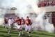 Sep 7, 2013; Bloomington, IN, USA; Indiana Hoosiers coach Kevin Wilson leads his team onto the field before the game against the Navy Midshipmen at Memorial Stadium. Mandatory Credit: Brian Spurlock-USA TODAY Sports