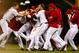 CINCINNATI, OH - SEPTEMBER 23: Shin-Soo Choo #17 of the Cincinnati Reds is congratulated by his teammates after hitting a walk-off double to defeat the New York Mets 3-2 in the 10th inning at Great American Ball Park on September 23, 2013 in Cincinnati, Ohio. (Photo by Kirk Irwin/Getty Images)