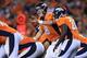 DENVER, CO - SEPTEMBER 23: Peyton Manning #18 of the Denver Broncos runs the offense against the Oakland Raiders at Sports Authority Field at Mile High on September 23, 2013 in Denver, Colorado. (Photo by Doug Pensinger/Getty Images)