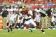 TAMPA, FL - AUGUST 29: Cornerback David Amerson #39 of the Washington Redskins runs upfield with an interception against the Tampa Bay Buccaneers August 29, 2013 at Raymond James Stadium in Tampa, Florida. (Photo by Al Messerschmidt/Getty Images)