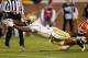 ATLANTA, GA - OCTOBER 29: David Sims #7 of the Georgia Tech Yellow Jackets dives for a touchdown against Jonathan Meeks #5 of the Clemson Tigers at Bobby Dodd Stadium on October 29, 2011 in Atlanta, Georgia. (Photo by Kevin C. Cox/Getty Images)