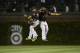 CHICAGO, IL - SEPTEMBER 24: Outfielders Starling Marte #6, Andrew McCutchen #22 and Marlon Byrd #2 of the Pittsburgh Pirates celebrate their win over the Chicago Cubs at Wrigley Field on September 24, 2013 in Chicago, Illinois. The Pirates defeated the Cubs 8-2. (Photo by Brian Kersey/Getty Images)