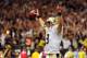 NEW ORLEANS, LA - SEPTEMBER 22: Drew Brees #9 of the New Orleans Saints celebrates a touchdown against the Arizona Cardinals during a game at the Mercedes-Benz Superdome on September 22, 2013 in New Orleans, Louisiana. The Saints defeated the Cardinals 31-7. (Photo by Stacy Revere/Getty Images)
