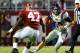 TUSCALOOSA, AL - SEPTEMBER 29: Bo Wallace #14 of the Mississippi Rebels scrambles away from Xzavier Dickson #47 of the Alabama Crimson Tide at Bryant-Denny Stadium on September 29, 2012 in Tuscaloosa, Alabama. (Photo by Kevin C. Cox/Getty Images)