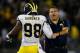 EAST HARTFORD, CT - SEPTEMBER 21: Brady Hoke, coach of the Michigan Wolverines, congratulates Devin Gardner #98 after a touchdown in the second half against the Connecticut Huskies at Rentschler Field on September 21, 2013 in East Hartford, Connecticut. (Photo by Jim Rogash/Getty Images)