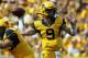 Sep 28, 2013; Morgantown, WV, USA; West Virginia Mountaineers quarterback Clint Trickett (9) passes the ball during the first half against the Oklahoma State Cowboys at Milan Puskar Stadium. Mandatory Credit: Peter Casey-USA TODAY Sports