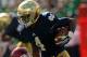 SOUTH BEND, IN - SEPTEMBER 28: George Atkinson III #4 of the Notre Dame Fighting Irish is tackled by Julian Wilson #2 of the Oklahoma Sooners at Notre Dame Stadium on September 28, 2013 in South Bend, Indiana. (Photo by Jonathan Daniel/Getty Images)