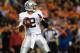 Sep 23, 2013; Denver, CO, USA; Oakland Raiders quarterback Terrelle Pryor (2) looks to pass the ball during the first half against the Denver Broncos at Sports Authority Field at Mile High. Mandatory Credit: Chris Humphreys-USA TODAY Sports