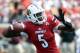Sep 7, 2013; Louisville, KY, USA; Louisville Cardinals quarterback Teddy Bridgewater (5) looks to pass against the Eastern Kentucky Colonels during the second half of play at Papa John's Cardinal Stadium. Louisville defeated Eastern Kentucky 44-7. Mandatory Credit: Jamie Rhodes-USA TODAY Sports