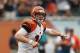 CHICAGO, IL - SEPTEMBER 08: Andy Dalton #14 of the Cincinnati Bengals calls a formation against the Chicago Bears at Soldier Field on September 8, 2013 in Chicago, Illinois. The Bears defeated the Bengals 24-21. (Photo by Jonathan Daniel/Getty Images)