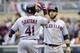 MINNEAPOLIS, MN - SEPTEMBER 28: Jason Kipnis #22 of the Cleveland Indians congratulates teammate Carlos Santana #41 on a two run home run against the Minnesota Twins during the fourth inning of the game on September 28, 2013 at Target Field in Minneapolis, Minnesota. (Photo by Hannah Foslien/Getty Images)
