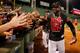 BOSTON, MA - SEPTEMBER 20: David Ortiz #34 of the Boston Red Sox interacts with fans after winning the AL East Division by beating the Toronto Blue Jays at Fenway Park on September 20, 2013 in Boston, Massachusetts. (Photo by Jim Rogash/Getty Images)