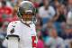 FOXBORO, MA - SEPTEMBER 22: Josh Freeman #5 of the Tampa Bay Buccaneers reacts after an incomplete pass in the second half against the Tampa Bay Buccaneers at Gillette Stadium on September 22, 2013 in Foxboro, Massachusetts. (Photo by Jim Rogash/Getty Images)