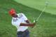 DUBLIN, OH - OCTOBER 01: Tiger Woods of the U.S. Team plays a shot during a practice round prior to the start of The Presidents Cup at the Muirfield Village Golf Club on October 1, 2013 in Dublin, Ohio. (Photo by Andy Lyons/Getty Images)