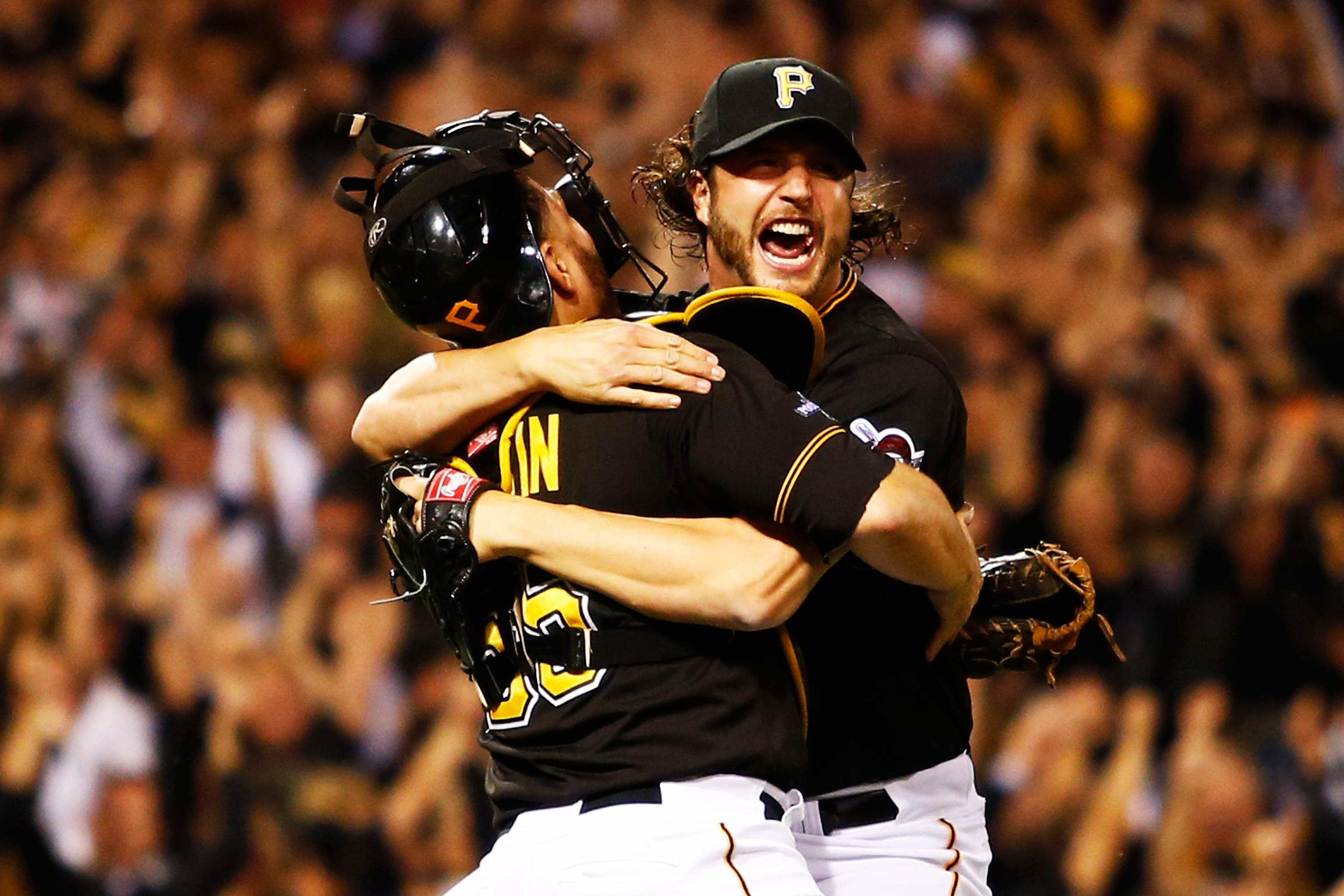 Pittsburgh Pirates' Russell Martin (55) and Jason Grilli celebrate with  teammates after their 5-3 game 3 win …