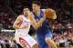 Apr 1, 2013; Houston, TX, USA; Orlando Magic center Nikola Vucevic (9) drives during the second quarter as Houston Rockets shooting guard Carlos Delfino (10) defends at Toyota Center. Mandatory Credit: Troy Taormina-USA TODAY Sports